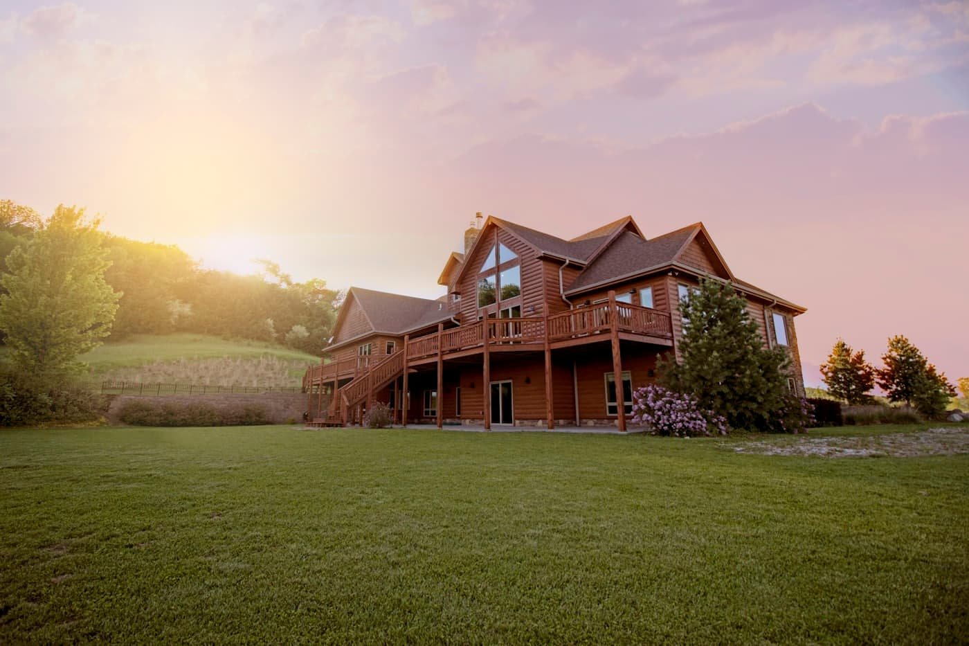 A house at golden hour with a solar array on its roof